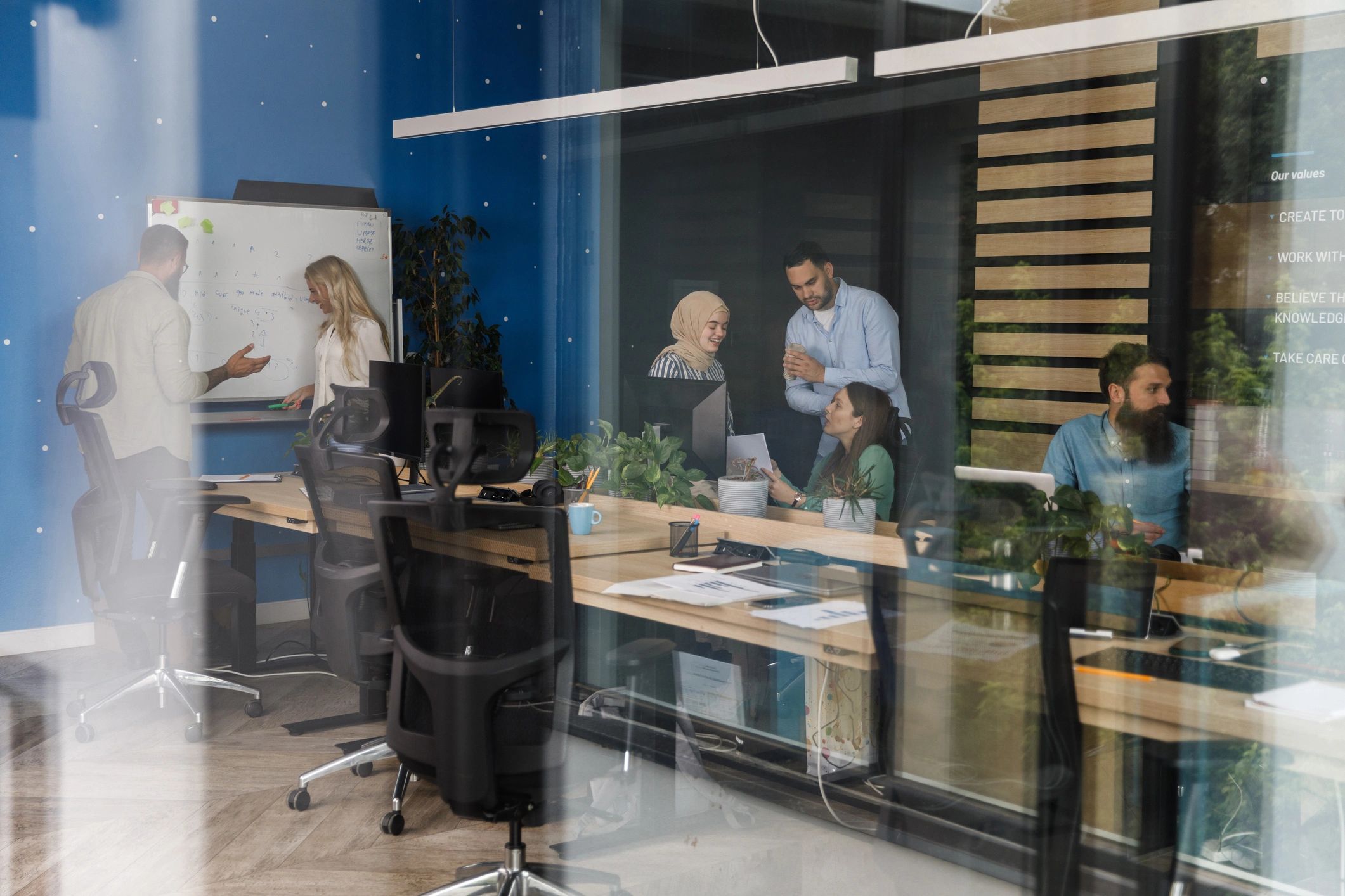 Business colleagues collaborating on strategy and project planning in a modern office